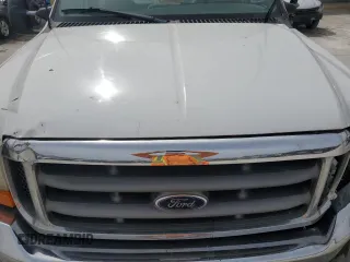 1999 Ford Super Duty F-250 XL with VIN 1FTNF21F7XEA07513, listed as a Copart auction lot 49390225 with 173,726 mi miles and Salvage Title. Bid and sale history available at carsss.com. Image 11.