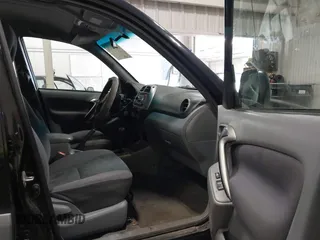 2001 Toyota RAV4 with VIN JTEGH20V810001120, listed as a IAAI auction lot 42671496 with 235,580 mi miles and . Bid and sale history available at DreamBid. Image 5.