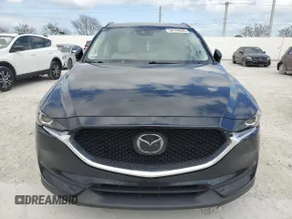 2021 Mazda CX-5 Touring z VIN JM3KFBCM8M1436782, wystawiony jako Copart lot #54144645 z przebiegiem 52 388 mil mil oraz Szkoda całkowita • Salvage title. Historia ofert i sprzedaży dostępna na DreamBid. Obrazek 5.