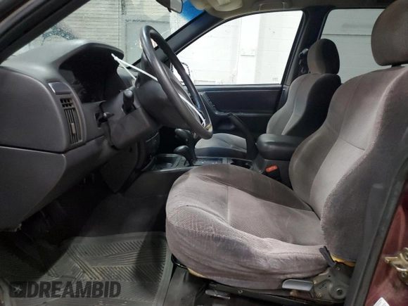 2001 Jeep Grand Cherokee Laredo with VIN 1J4GW48S11C618478, listed as a Copart auction lot 57889965 with Not provided miles and Clean title. Bid and sale history available at DreamBid. Image 7.