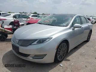 2014 Lincoln MKZ with VIN 3LN6L2GK4ER814286, listed as a IAAI auction lot 42657654 with 135,708 mi miles and . Bid and sale history available at DreamBid. Image 2.