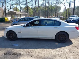 2014 BMW 7 Series 740Li with VIN WBAYE4C59ED138409, listed as a IAAI auction lot 41785423 with 121,687 mi miles. Bid and sale history available at carsss.com. Image 14.