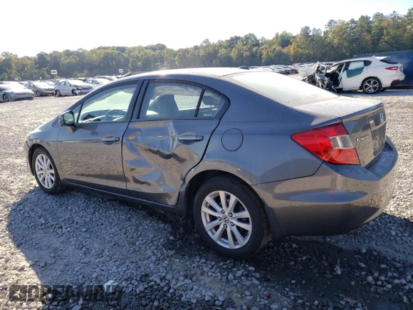 2012 Honda Civic EX-L with VIN 19XFB2F94CE048523, listed as a Copart auction lot 77019404 with 210,391 mi miles and Salvage Title. Bid and sale history available at DreamBid. Image 2.