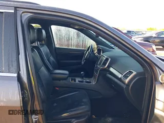 2015 Jeep Grand Cherokee Laredo with VIN 1C4RJFAGXFC631123, listed as a IAAI auction lot 41859251 with 201,558 mi miles. Bid and sale history available at carsss.com. Image 5.