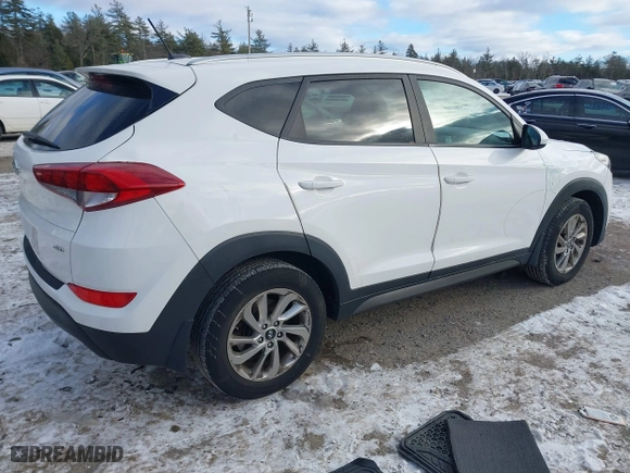 2016 Hyundai Tucson SE with VIN KM8J3CA44GU254260, listed as a IAAI auction lot 41328567 with 124,554 mi miles. Bid and sale history available at carsss.com. Image 4.