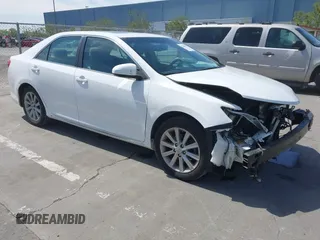 2014 Toyota Camry L with VIN 4T4BF1FK4ER391239, listed as a IAAI auction lot 42086967 with 97,016 mi miles. Bid and sale history available at carsss.com. Image 1.