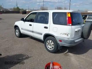2000 Honda CR-V LX with VIN JHLRD1841YC062688, listed as a IAAI auction lot 41831701 with 157,115 mi miles. Bid and sale history available at carsss.com. Image 3.