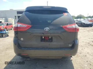 2017 Toyota Sienna XLE with VIN 5TDDZ3DC6HS186360, listed as a Copart auction lot 57504965 with 99,026 mi miles and Salvage title. Bid and sale history available at DreamBid. Image 6.