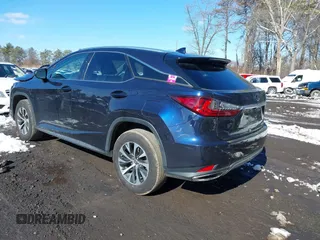 2021 Lexus RX with VIN 2T2HZMDA4MC277227, listed as a IAAI auction lot 41527380 with 52,580 mi miles. Bid and sale history available at carsss.com. Image 3.