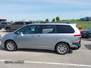 2014 Toyota Sienna XLE z VIN 5TDYK3DC0ES451307, wystawiony jako IAAI lot #42093569 z przebiegiem 105 721 mil mil oraz . Historia ofert i sprzedaży dostępna na DreamBid. Obrazek 15.