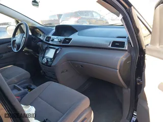 2016 Honda Odyssey SE with VIN 5FNRL5H34GB139571, listed as a IAAI auction lot 41602695 with 118,960 mi miles. Bid and sale history available at carsss.com. Image 5.