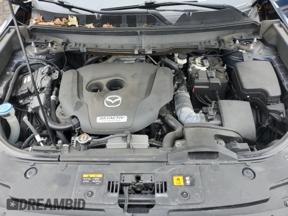 2018 Mazda CX-9 Touring with VIN JM3TCBCY8J0225549, listed as a Copart auction lot 61172975 with 89,969 mi miles and Salvage title. Bid and sale history available at DreamBid. Image 12.