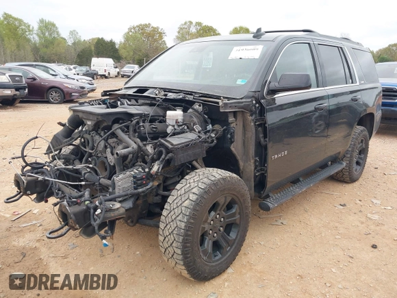 2017 Chevrolet Tahoe LT with VIN 1GNSKBKCXHR388181, listed as a IAAI auction lot 41936609 with 94,783 mi miles and . Bid and sale history available at DreamBid. Image 2.