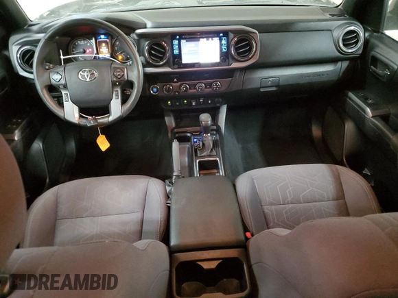 2019 Toyota Tacoma SR z VIN 3TMCZ5AN1KM285074, wystawiony jako Copart lot #53545975 z przebiegiem 53 838 mil mil oraz Szkoda całkowita • Salvage title. Historia ofert i sprzedaży dostępna na DreamBid. Obrazek 8.