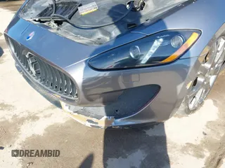 2013 Maserati GranTurismo Sport with VIN ZAM45VLA7D0074506, listed as a IAAI auction lot 41455462 with 34,292 mi miles. Bid and sale history available at carsss.com. Image 6.