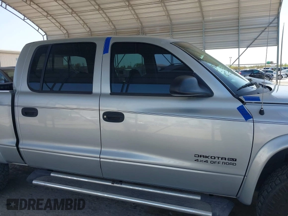 2002 Dodge Dakota SLT with VIN 1B7HG48N62S546119, listed as a IAAI auction lot 41826998 with 157,761 mi miles. Bid and sale history available at carsss.com. Image 13.