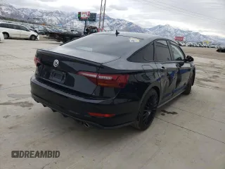 2019 Volkswagen Jetta GLI S z VIN 3VW6T7BU2KM148545, wystawiony jako Copart lot #66548482 z przebiegiem 87 450 mil mil oraz . Historia ofert i sprzedaży dostępna na DreamBid. Obrazek 4.