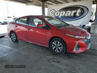 2017 Toyota Prius Plus z VIN JTDKARFPXH3034696, wystawiony jako Copart lot #59569325 z przebiegiem 86 171 mil mil oraz Szkoda całkowita • Salvage title. Historia ofert i sprzedaży dostępna na DreamBid. Obrazek 4.
