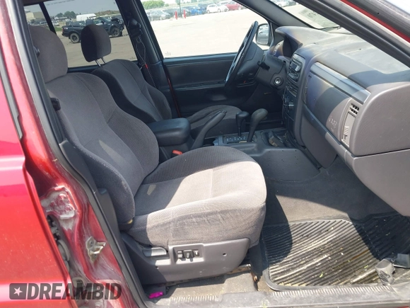 2001 Jeep Grand Cherokee Laredo with VIN 1J4GW48S81C727262, listed as a IAAI auction lot 42402470 with 228,167 mi miles and . Bid and sale history available at DreamBid. Image 5.