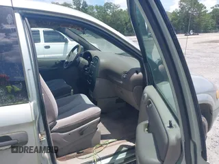 2003 Dodge Caravan SE with VIN 1D4GP25323B208661, listed as a IAAI auction lot 42766140 with 217,025 mi miles and . Bid and sale history available at DreamBid. Image 5.