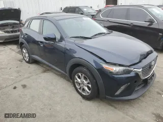 2016 Mazda CX-3 Touring with VIN JM1DKFC70G0136632, listed as a Copart auction lot 82004974 with 87,249 mi miles and Salvage Title. Bid and sale history available at carsss.com. Image 4.