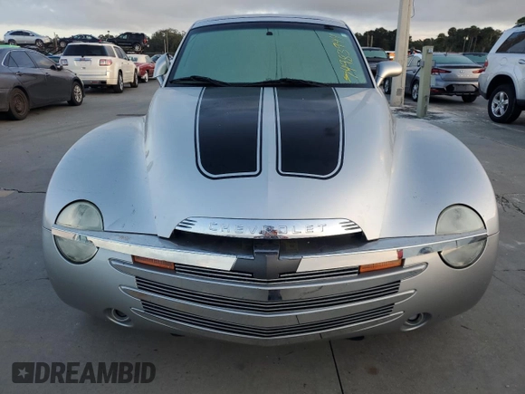 2004 Chevrolet SSR LS z VIN 1GCES14P14B105315, wystawiony jako Copart lot #74983944 z przebiegiem Nie podano mil oraz Szkoda całkowita • Salvage title. Historia ofert i sprzedaży dostępna na DreamBid. Obrazek 5.