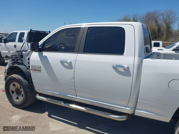 2015 Ram 2500 Big Horn with VIN 3C6TR5DT9FG584320, listed as a IAAI auction lot 41844435 with 214,600 mi miles. Bid and sale history available at carsss.com. Image 14.