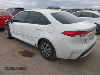 2021 Toyota Corolla Hybrid LE with VIN JTDEAMDE6MJ008815, listed as a IAAI auction lot 41586643 with 7,548 mi miles. Bid and sale history available at carsss.com. Image 3.