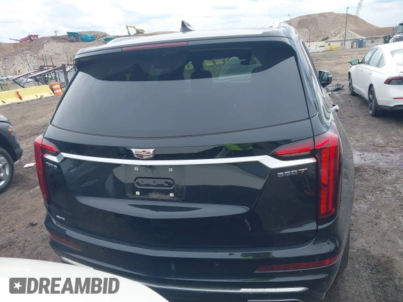2024 Cadillac XT6 AWD Luxury z VIN 1GYKPBR49RZ723838, wystawiony jako IAAI lot #42346554 z przebiegiem 27 525 mil mil oraz . Historia ofert i sprzedaży dostępna na DreamBid. Obrazek 16.