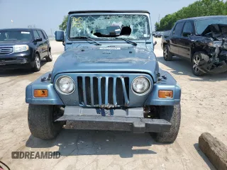 1999 Jeep Wrangler SE with VIN 1J4FY29P0XP422425, listed as a Copart auction lot 60513335 with Not provided miles and Clean title. Bid and sale history available at DreamBid. Image 5.