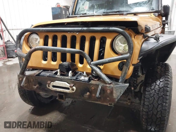2014 Jeep Wrangler Unlimited Rubicon with VIN 1C4BJWFG7EL254534, listed as a IAAI auction lot 41279731 with 140,218 mi miles. Bid and sale history available at carsss.com. Image 6.