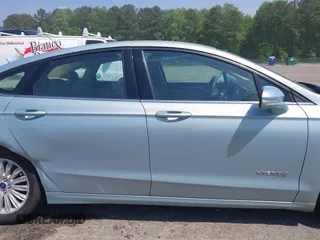2014 Ford Fusion SE Hybrid with VIN 3FA6P0LU8ER251057, listed as a IAAI auction lot 42150589 with 188,192 mi miles and . Bid and sale history available at DreamBid. Image 13.