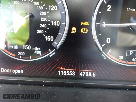 2011 BMW 7 Series 740i with VIN WBAKA4C58BC392020, listed as a IAAI auction lot 41314751 with 116,553 mi miles. Bid and sale history available at carsss.com. Image 15.