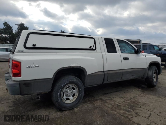 2008 Dodge Dakota z VIN 1D3HW22K18S638485, wystawiony jako Copart lot #86774214 z przebiegiem 189 304 mil mil oraz Szkoda całkowita • Salvage title. Historia ofert i sprzedaży dostępna na DreamBid. Obrazek 3.