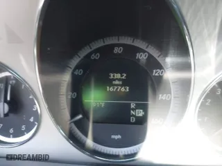 2010 Mercedes-Benz E-Class E 350 Luxury with VIN WDDHF5GBXAA022398, listed as a IAAI auction lot 42011533 with 167,763 mi miles. Bid and sale history available at carsss.com. Image 7.