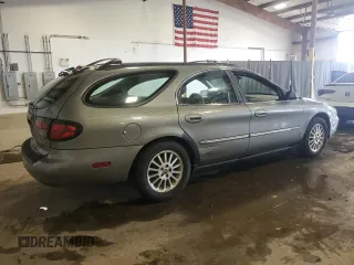 2002 Mercury Sable with VIN 1MEFM58U82G612541, listed as a Copart auction lot 60254405 with 171,854 mi miles and Salvage title. Bid and sale history available at DreamBid. Image 3.