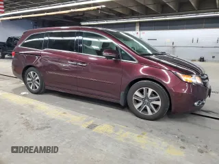 2014 Honda Odyssey Touring with VIN 5FNRL5H93EB079817, listed as a Copart auction lot 56231645 with 65,521 mi miles and Salvage title. Bid and sale history available at DreamBid. Image 4.
