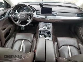 2014 Audi A8 3.0L TDI z VIN WAURMAFD3EN001307, wystawiony jako Copart lot #43476125 z przebiegiem 85 921 mil mil oraz Tytuł czysty. Historia ofert i sprzedaży dostępna na DreamBid. Obrazek 8.