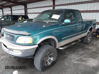 1997 Ford F-150 XL with VIN 1FTDX18W9VKC62901, listed as a IAAI auction lot 41495680 with 205,443 mi miles. Bid and sale history available at carsss.com. Image 2.