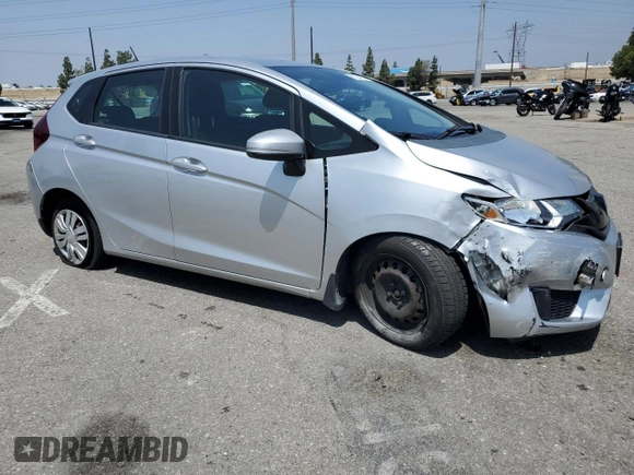 2015 Honda Fit LX with VIN 3HGGK5H55FM748370, listed as a Copart auction lot 61524455 with 87,235 mi miles and Salvage title. Bid and sale history available at DreamBid. Image 4.