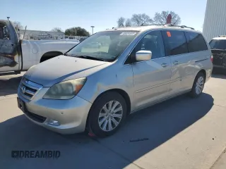 2005 Honda Odyssey TOURING with VIN 5FNRL388X5B126627, listed as a Copart auction lot 46654645 with 220,805 mi miles and Salvage Title. Bid and sale history available at carsss.com. Image 1.