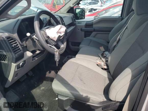 2018 Ford F-150 XL with VIN 1FTEW1EB7JKD92713, listed as a Copart auction lot 65621244 with 32,671 mi miles and Salvage Title. Bid and sale history available at carsss.com. Image 7.