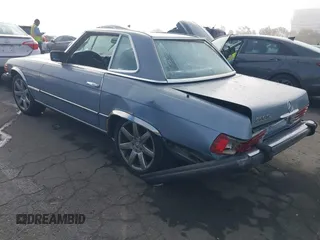 1985 Mercedes-Benz 380 z VIN WDBBA45C5FA029222, wystawiony jako IAAI lot #41658132 z przebiegiem 129 548 mil mil oraz . Historia ofert i sprzedaży dostępna na DreamBid. Obrazek 3.