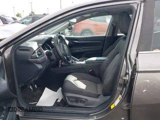 2020 Toyota Camry LE with VIN 4T1C11AK3LU363417, listed as a IAAI auction lot 41430382 with 130,837 mi miles. Bid and sale history available at carsss.com. Image 5.