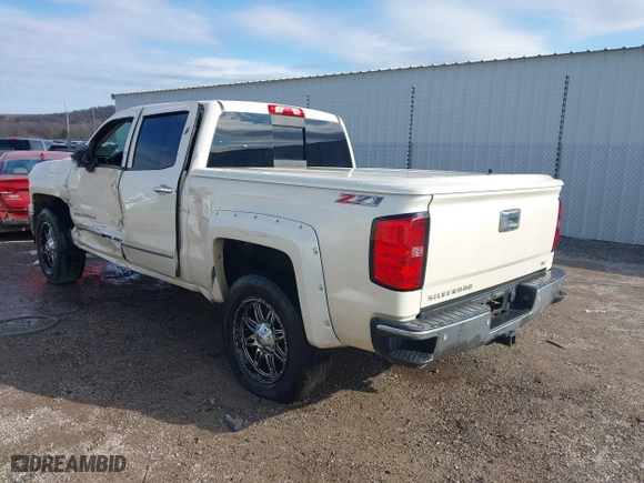 2014 Chevrolet Silverado 1500 LTZ with VIN 3GCUKSEC5EG165684, listed as a IAAI auction lot 41114072 with 133,423 mi miles. Bid and sale history available at carsss.com. Image 3.