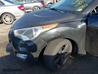 2015 Hyundai Veloster with VIN KMHTC6AD0FU245001, listed as a IAAI auction lot 41881391 with 119,873 mi miles. Bid and sale history available at carsss.com. Image 6.