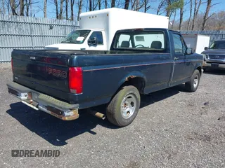 1995 Ford F-150 with VIN 1FTDF15Y5SNA21470, listed as a IAAI auction lot 42066183 with 112,523 mi miles. Bid and sale history available at carsss.com. Image 4.