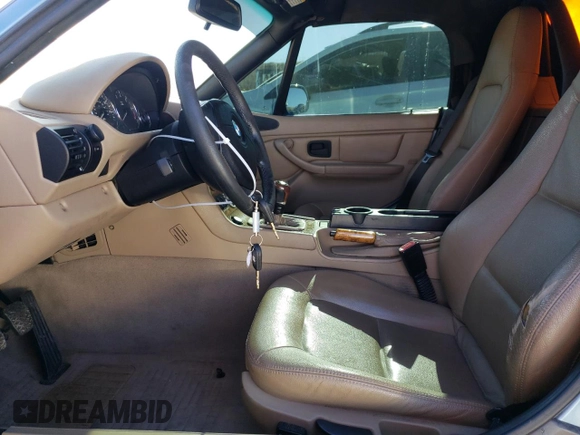 2002 BMW Z3 2.5i with VIN 4USCN33452LK51624, listed as a Copart auction lot 47388825 with 100,044 mi miles and Salvage Title. Bid and sale history available at carsss.com. Image 7.