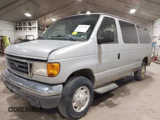 2007 Ford Econoline Passenger XL with VIN 1FBNE31L67DA26594, listed as a IAAI auction lot 41753476 with 154,709 mi miles. Bid and sale history available at carsss.com. Image 2.