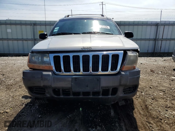 2000 Jeep Grand Cherokee Laredo z VIN 1J4GW48N9YC239166, wystawiony jako Copart lot #53321135 z przebiegiem 142 162 mil mil oraz Szkoda całkowita • Salvage title. Historia ofert i sprzedaży dostępna na DreamBid. Obrazek 5.